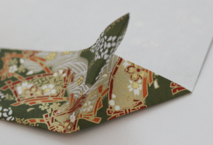Hinweis, Origami Teelichthalter in Kronenform